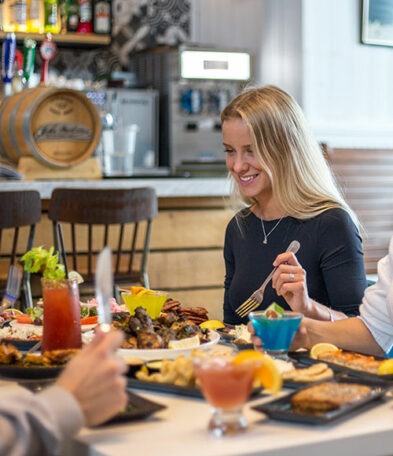 Blonde girl about to taste her food