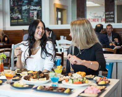 Two girls having fun at dinner night