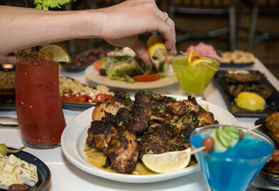 Lots of Souvlaki Bar plates on a table